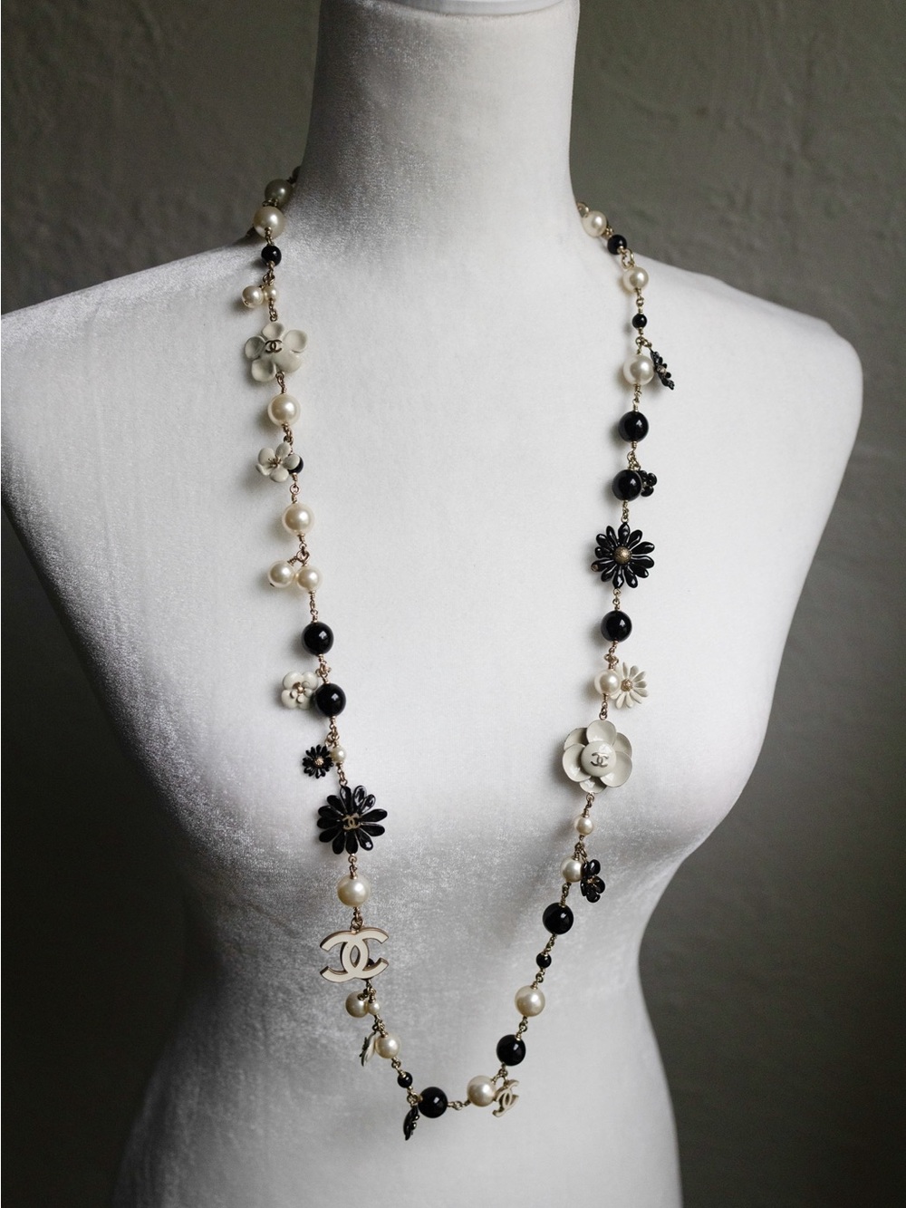 CHANEL Long Pearl Necklace with Black & Ivory Floral Charms